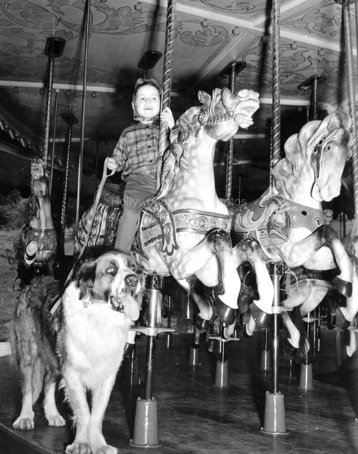 1941 2 Carolyn Lee rides Carousel wm.jpg